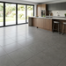 Dwell Smoke 600x600mm Polished Finish Floor Tile — kitchen setting